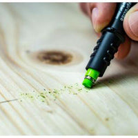 Hand erasing a line on a piece of wood with a Pica Fine Dry Eraser