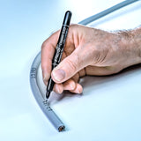 Hand writing on a cable with a Pica Classic 533 Fine Permanent Pen