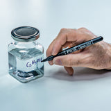Hand writing on a glass jar with a Pica Classic 534 Marker